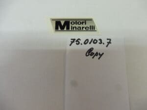 75.0103.0 Emblem clutch/ignition cover Minarelli P6 Corsa Corta