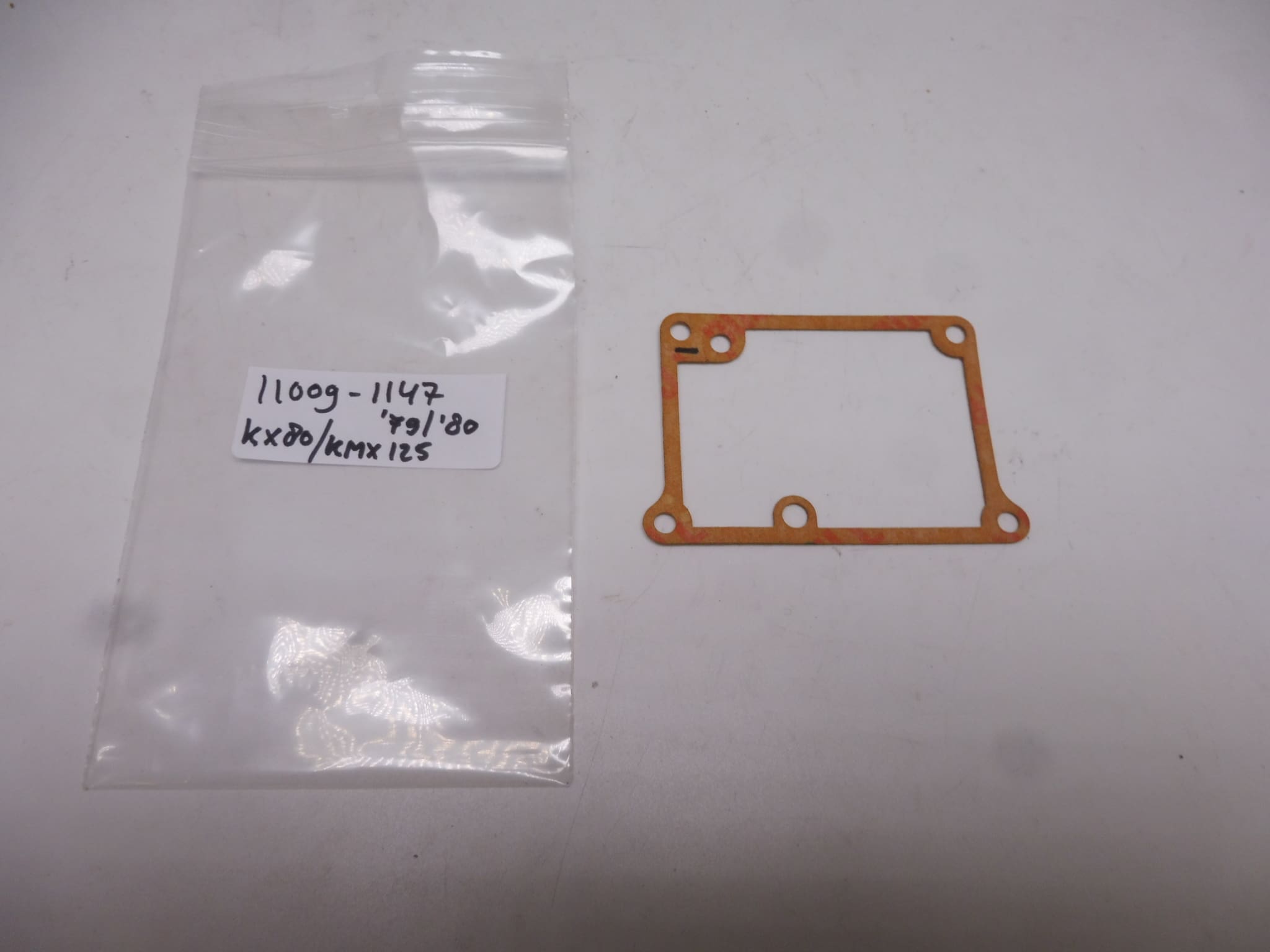 11009-1147 Gasket float chamber carburator KX 80/KMX 125 '79-'80 original