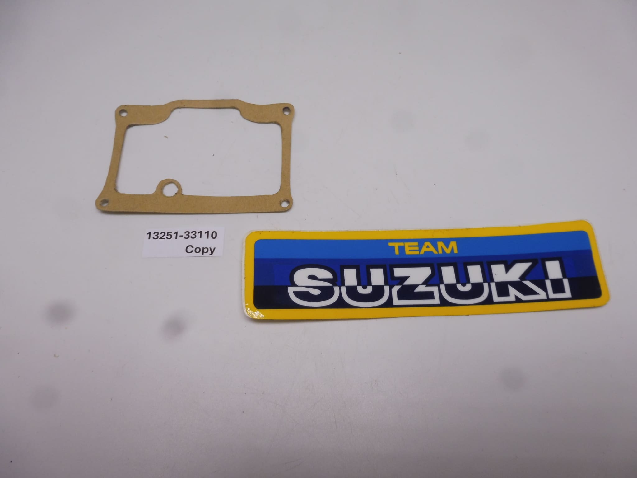 13251-33110 Gasket float GT380A. T-GT500-GT550L.M.K.A. and GT750 J.K.