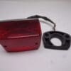 23025-1033 Taillight complete Kawasaki 305 original used