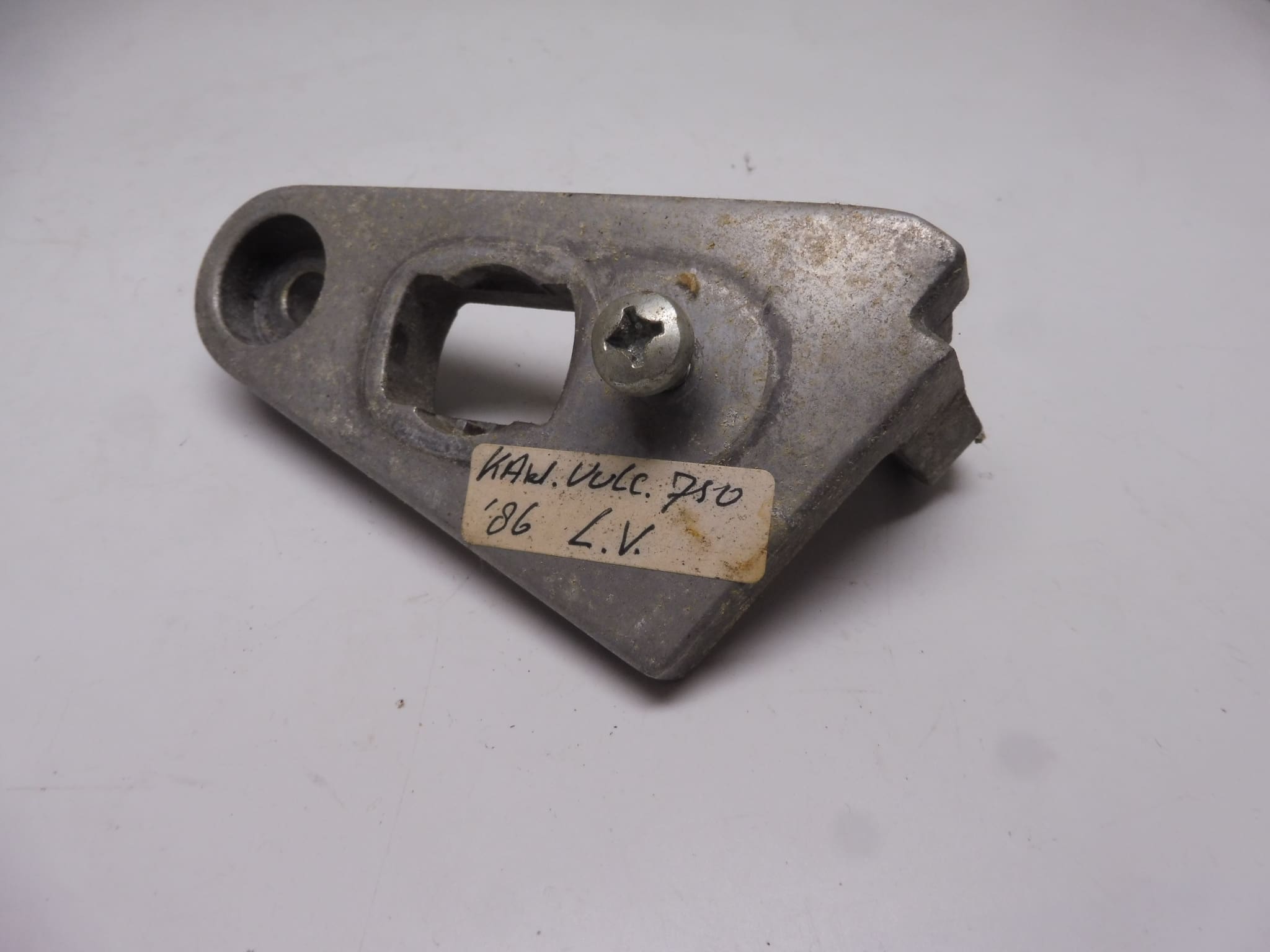 11043-1942 Stay L. headlight Kawasaki EN450/LTD454/VN700-750 used