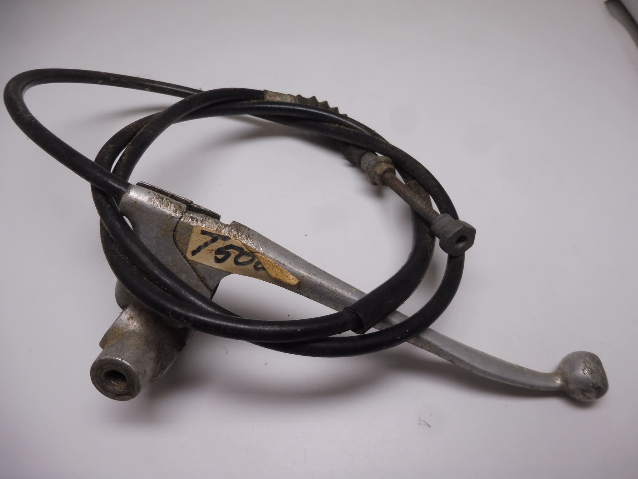57300-30501 Front brake lever cpl. w. cable Suzuki T500 used w. scratch